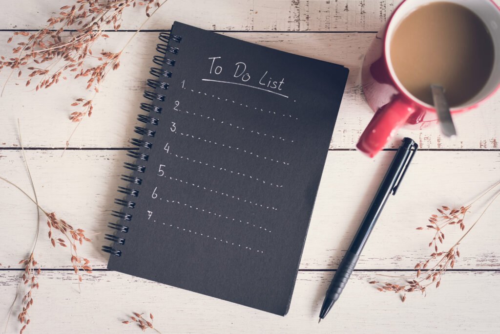 Writing a to-do list helps organize your day and achieve goals.